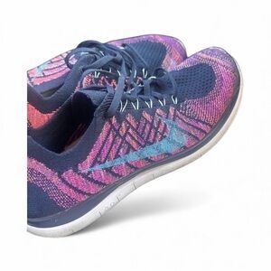 Nike Women's FlyKnit Pink and Blue Athletic Shoes